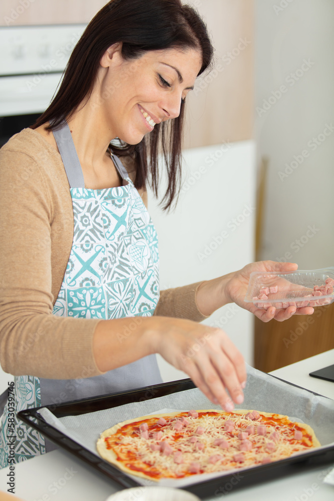 housewife making a homemade piza