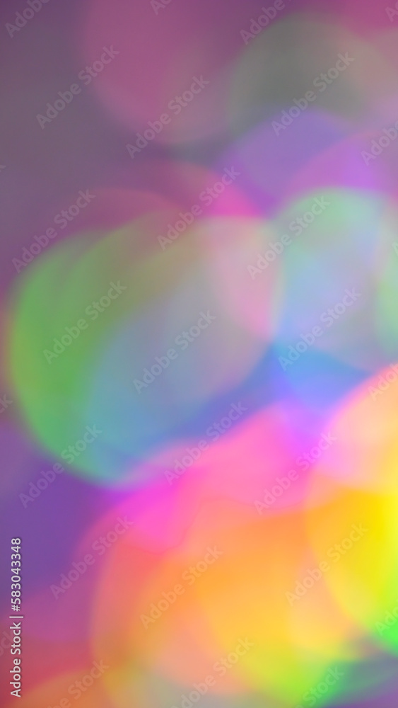 colorful abstract blue pink yellow blur rainbow bokeh gradient background. multicolored glowing texture