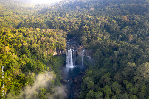 Fototapeta Naklejka Na Ścianę i Meble -  K50 waterfall. The majestic K50 waterfall is still very wild in the tropical jungle in K 'Bang district, Gia Lai province, Vietnam  