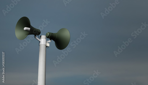 public address notification megaphones on a post, 3d rendering. Outdoor notification loudspeakers for announcement or air raid alert, sky background photo