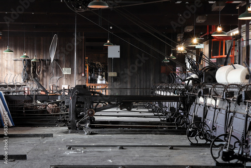 Leeds Industrial Museum. The old black engine on factory fabric floor photo