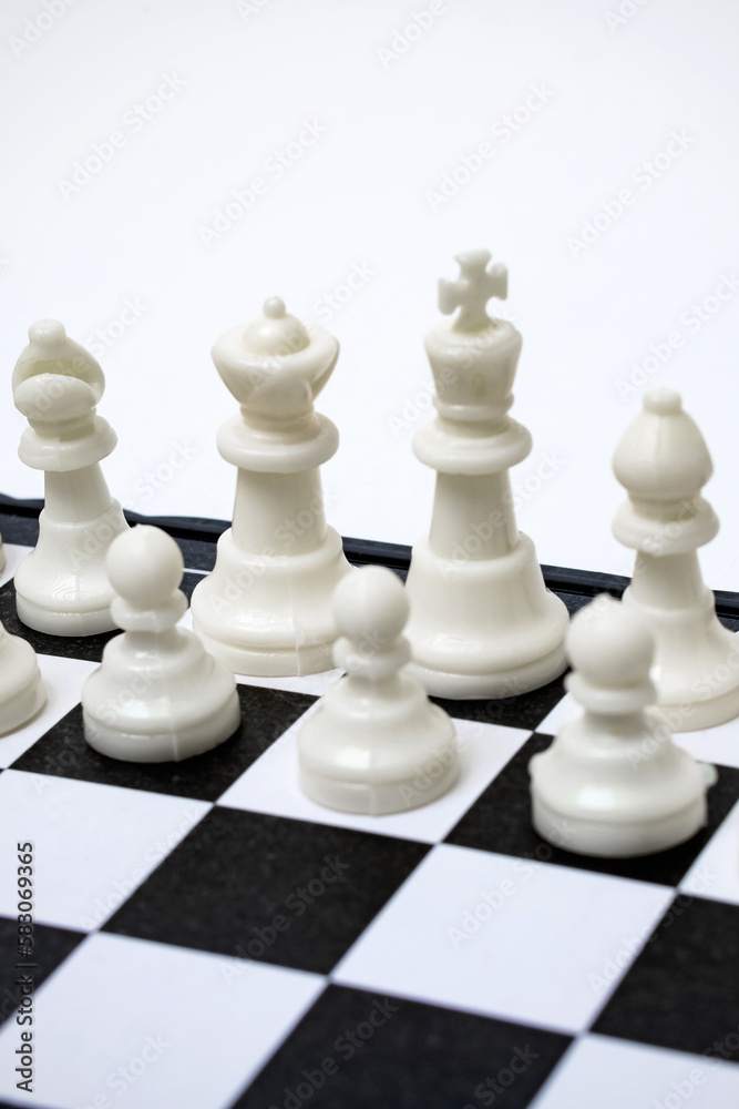 White side of chess on a white background White side of chess on a white background