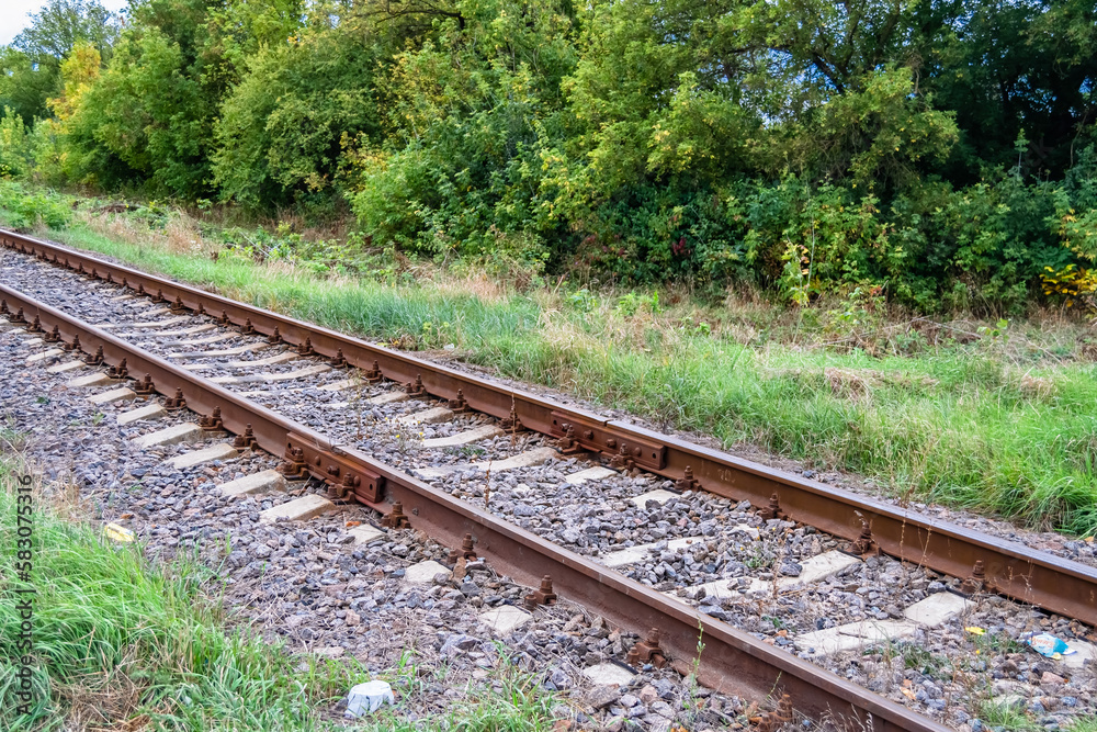 Photography to theme railway track after passing train on railroad Photography to theme railway track after passing train on railroad