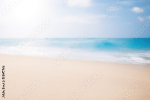 blurred beach background with sunrays, summer sandy empty beach