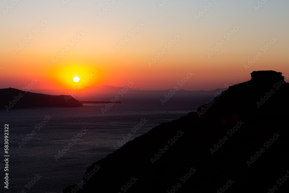 sunset over the sea santorini