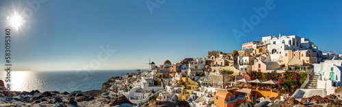 Amazing panoramic view of town of Oia waiting for sunset. Santorini, Greece