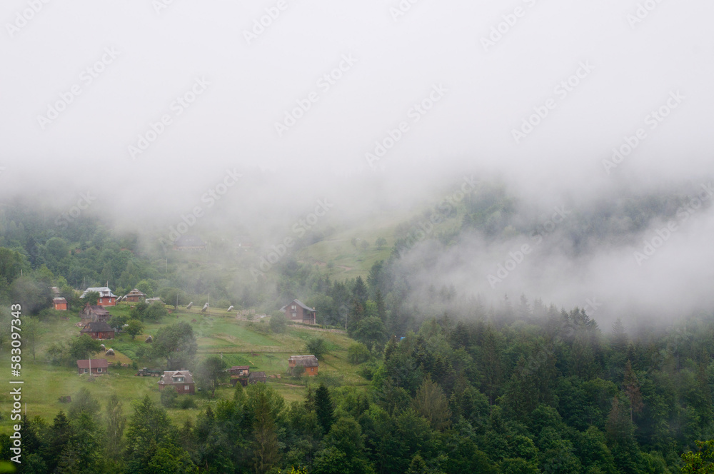 fog under carpathian mountains
