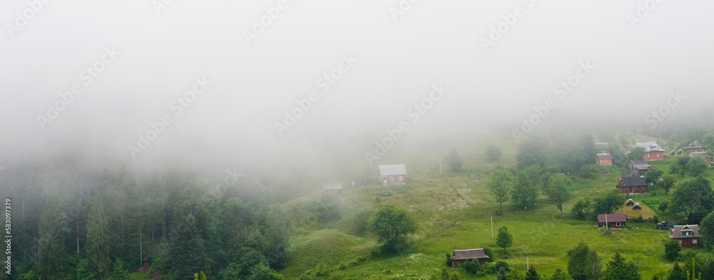 fog under carpathian mountains