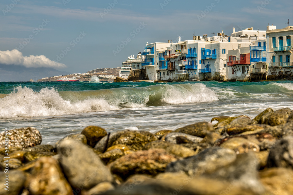 View of little Venice houses from the beach in Mykonos, Greece
