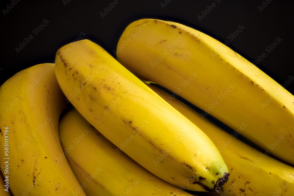 bunch of bananas on black background
