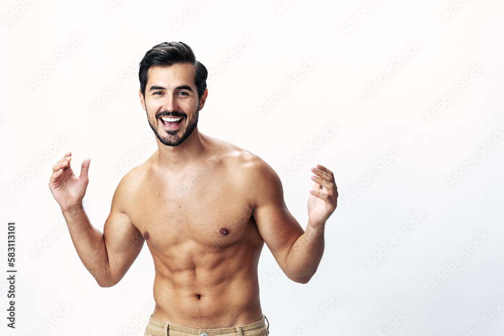 Male athlete model with naked torso and packs of abs sporty on white isolated background, trendy clothing style, copy space, space for text Male athlete model with naked torso and packs of abs sporty on white isolated background, trendy clothing style, copy space, space for text