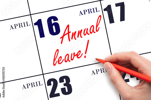 Hand writing the text ANNUAL LEAVE and drawing the sun on the calendar date April 16