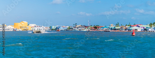 A view approaching the port of Belize City, Belize from the sea on a sunny day