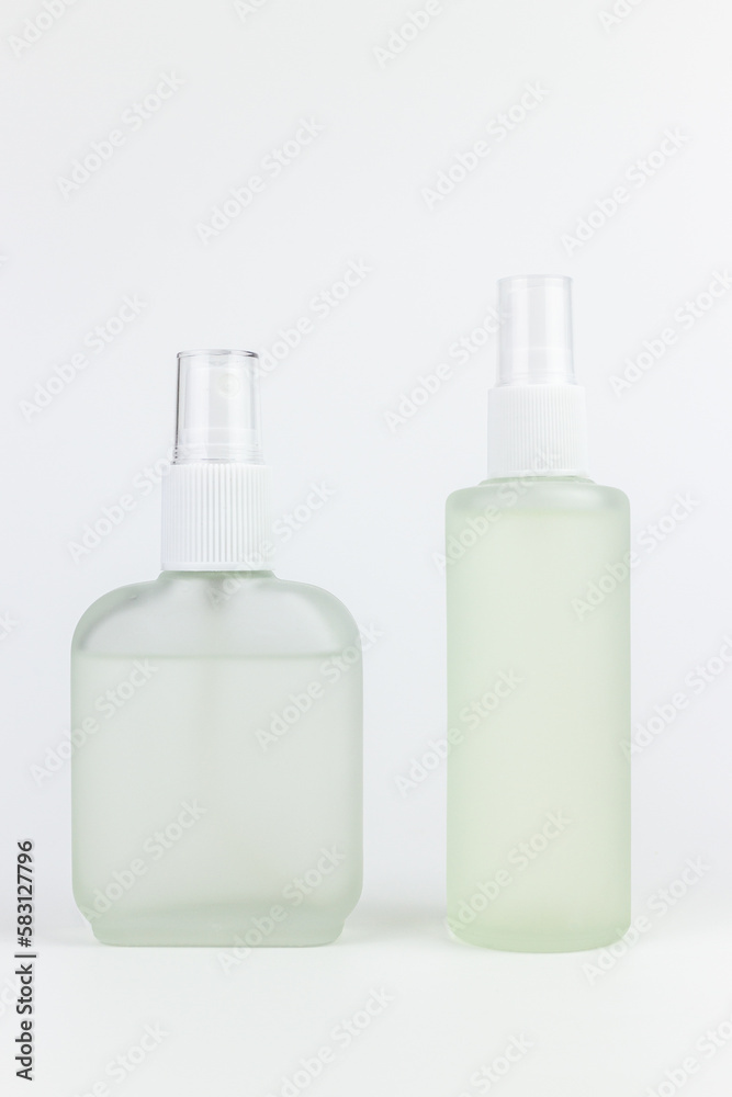 Cosmetic bottle isolated on white background with clipping path. Skin care concept. Cosmetic bottle isolated on white background with clipping path. Skin care concept.