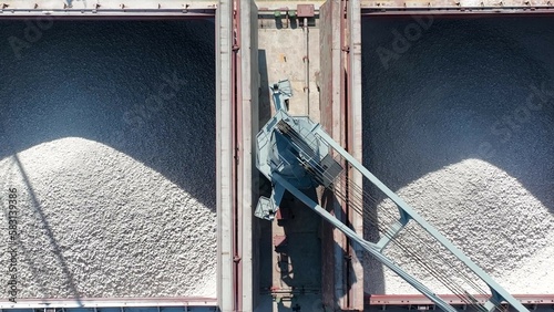 Work at a huge limestone quarry, production of aggregates., heavy machines in action, transferring the material, crusher complex, travel with ships