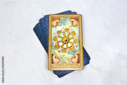 Bangkok, Thailand 14 feb23, Influence Of The Angels Tarot spreading with wheel of fortune, the best card on top. Intuition spiritual new age tarot reading advices forecasting.