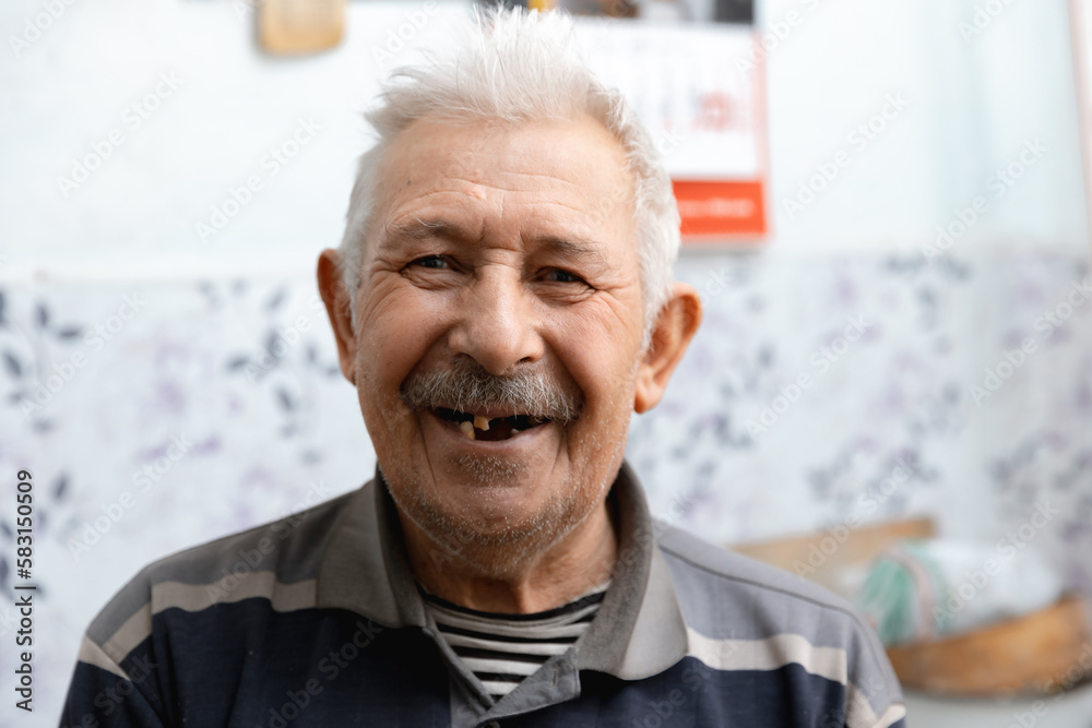 Old man without part of his teeth is smiling Old man without part of his teeth is smiling