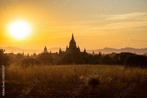 Silhouette of Temples in Bagan, Myanmar, in Front of the Setting Sun.
