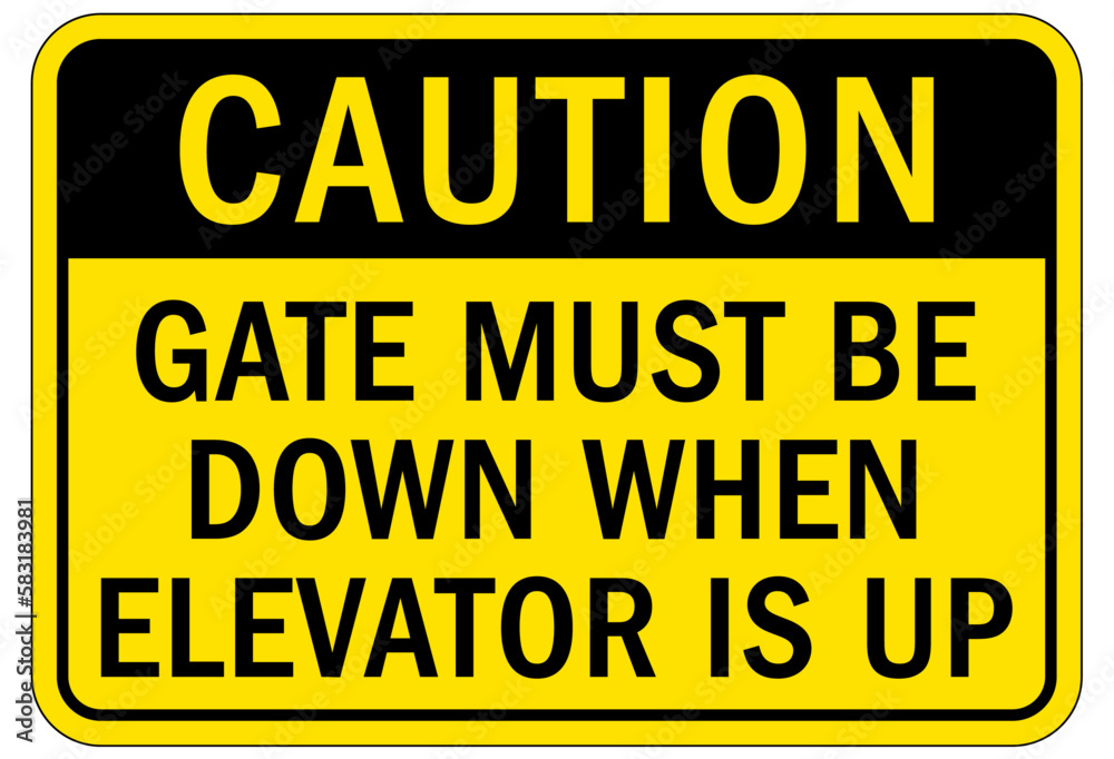 Elevator warning sign and labels gate must be down when elevator is up