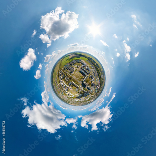 Wallpaper Mural tiny planet in sky with clouds overlooking old town, urban development, historic buildings and crossroads. Transformation of spherical 360 panorama in abstract aerial view. Torontodigital.ca