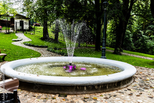 Artesia fountain in the Monastery park. Sinaia, Romania.