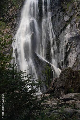 Vertical shot of the Powerscourt Waterfall in autumn in Portlaoise, County Laois, Ireland