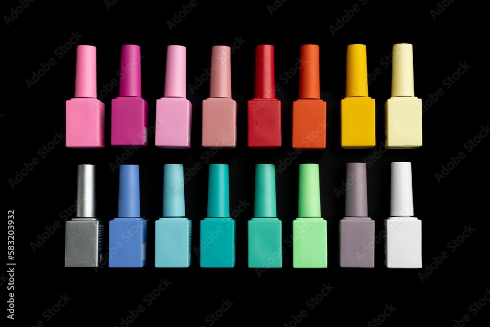 Closeup of Manicures in different colors in black background