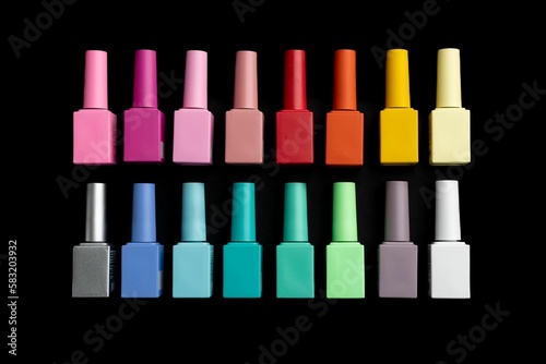 Closeup of Manicures in different colors in black background