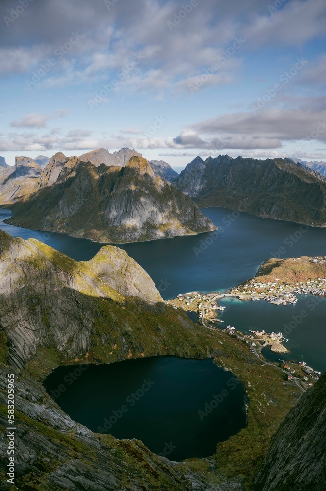 Aerial shot of the scenic Lofoten Islands in Nordland, Norway under a cloudy sky