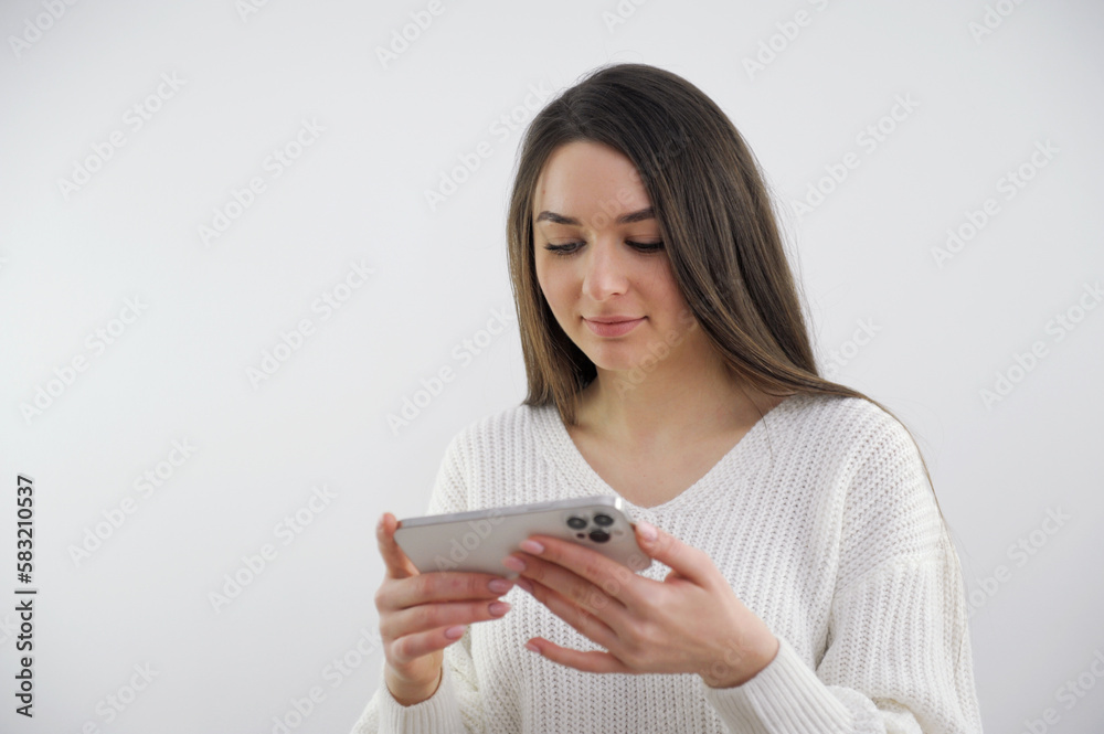 pretty female teenager using smartphone . High quality photo pretty female teenager using smartphone . High quality photo