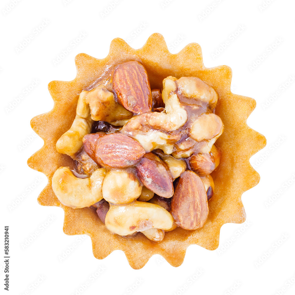 Tart cake with different nuts in sweet glaze, top view, isolated on white background with clipping path