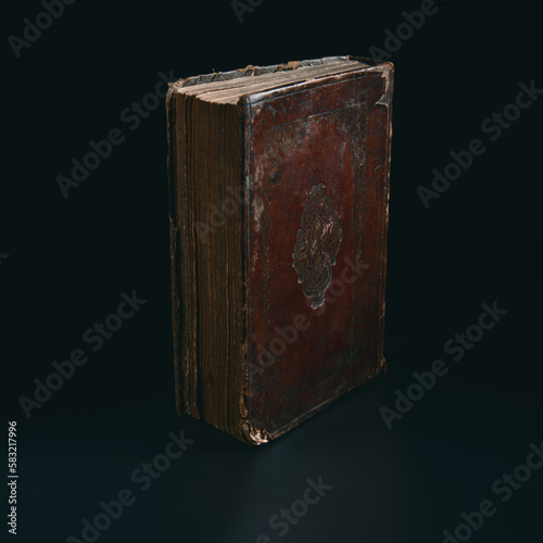 Obraz na płótnie Leather bound book with gold embossing. Torah book standing in the dark. Education and religion concept. Low key. Closeup. w salonie