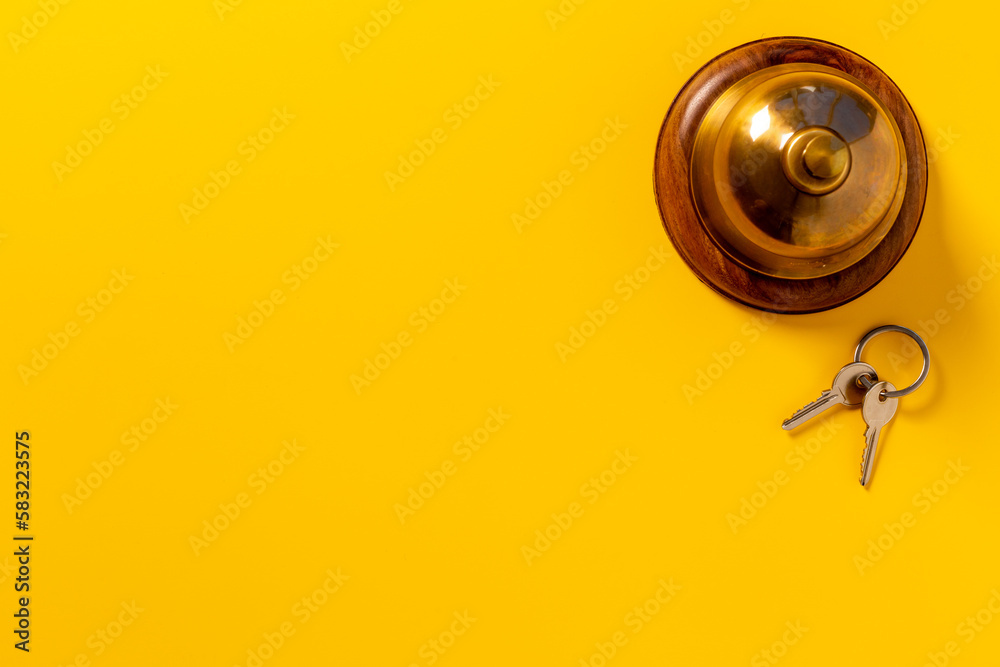 Hotel service bell with keys. Booking and checkin concept Hotel service bell with keys. Booking and checkin concept