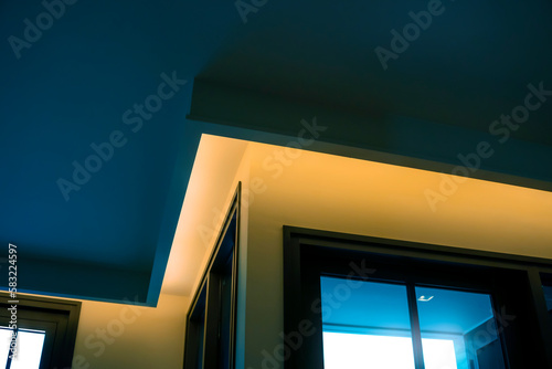Valokuva interior hidden LED lighting above window glass.
