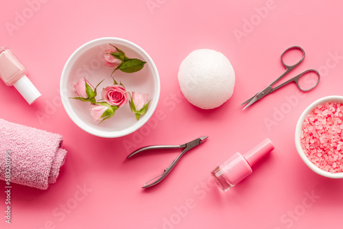 Manicure accessories with roses and towel. Beauty care salon spa.