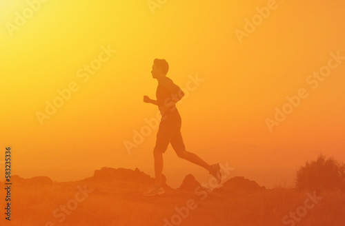 Young fit male running exercising. Fitness goals and active lifestyle concept. 