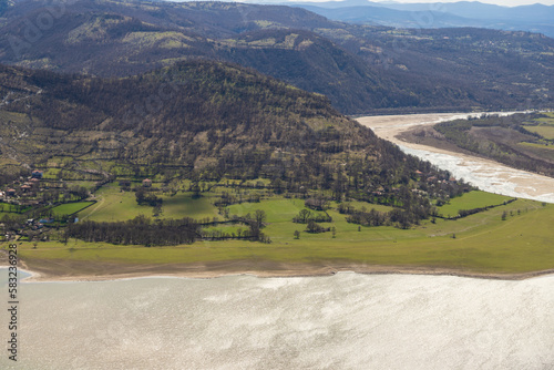 View of part of the bank of Kardzhali Dam, towards Monyak Fortress, Bulgaria photo