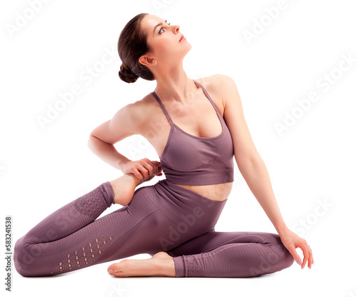 young woman doing yoga practice isolated on white background, healthy lifestyle concept