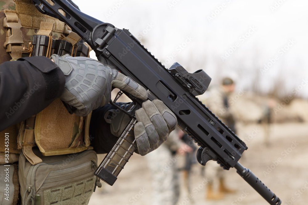 Ukrainian soldier training with modern 9mm submachine gun on military ...