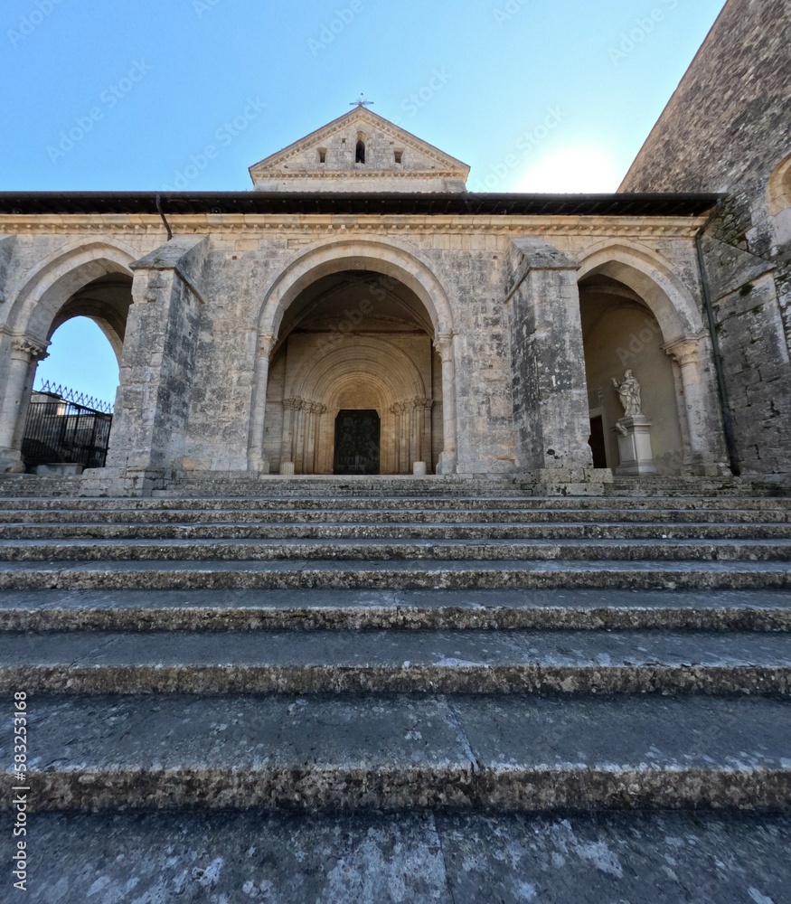 The facade of the Casamari cathedral, overlooking the entrance courtyard of a medieval monastery near Rome, Italy.