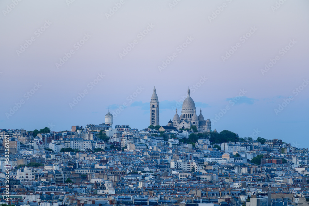 The Basilica of the Sacred Heart on the Montmartre hill , Europe, France, Ile de France, Paris, in summer on a sunny day.