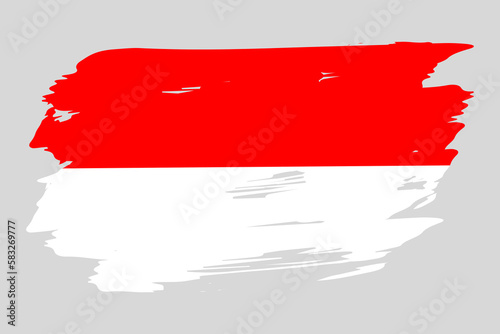 Flag of Indonesia painted with a brush stroke. Abstract concept. National flag in grunge style. Vector illustration