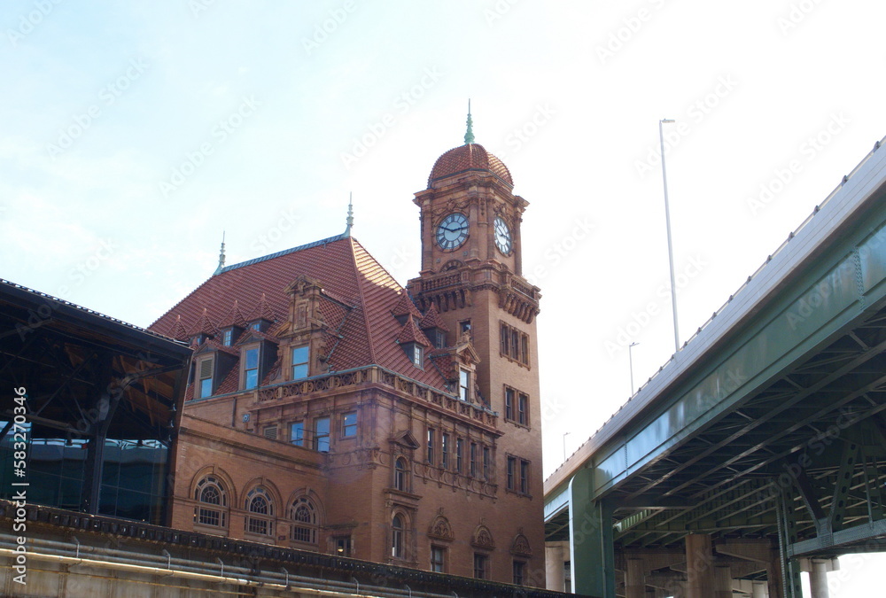 Side and front views of the historic Main Street Train Station in Richmond, Virginia. showing how it is hemmed in by the I-95 Interstate Highway.