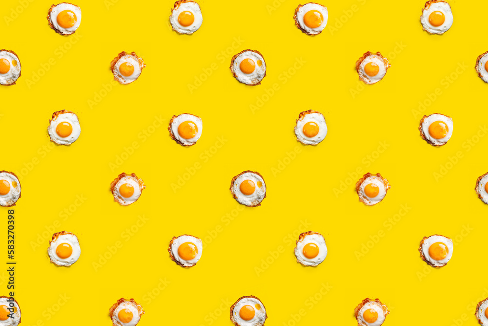Fried Eggs on a yellow background. Sunny Side up. Breakfast background. Generative AI. Fried Eggs on a yellow background. Sunny Side up. Breakfast background. Generative AI.