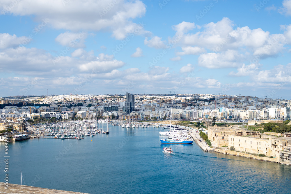 View on Sliema, Malta from Valetta. City view with the blue, Mediterranean sea