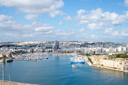 View on Sliema, Malta from Valetta. City view with the blue, Mediterranean sea © Natalia