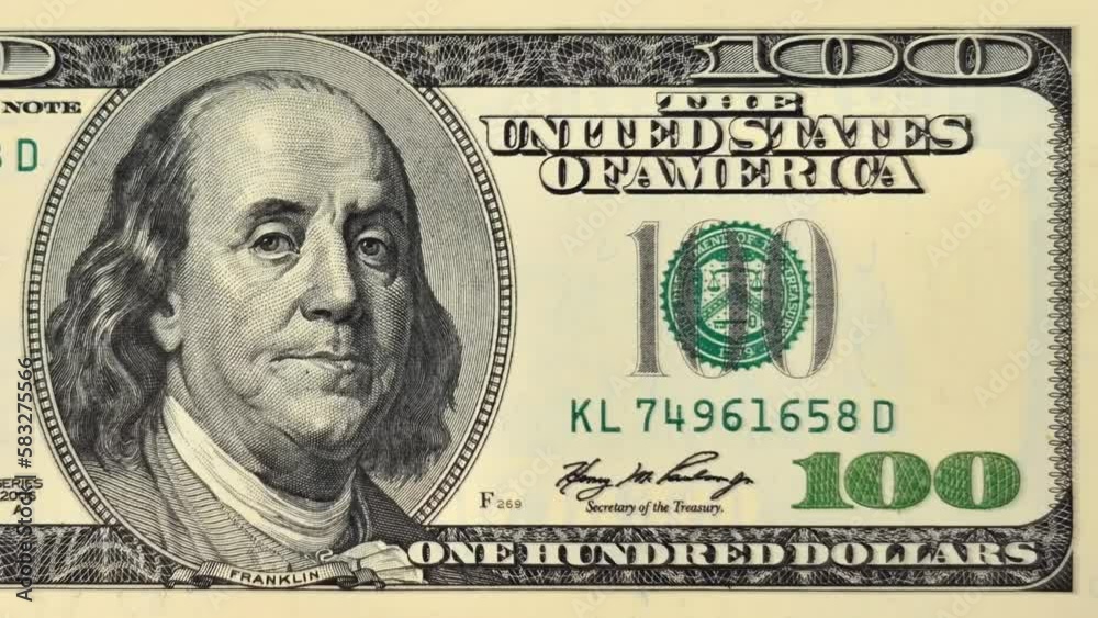 Как выглядит 100 баксов 100 dollar bill money, macro. Shooting of money. Видео Stock Adobe Stock