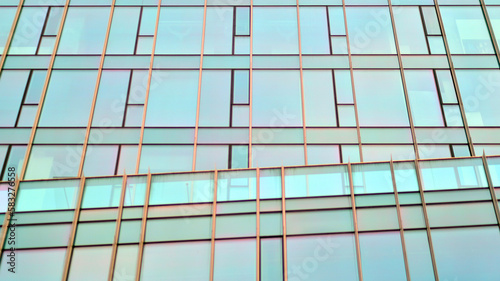 Blue background of glass commercial building, modern city of future. Business concept of architecture.
