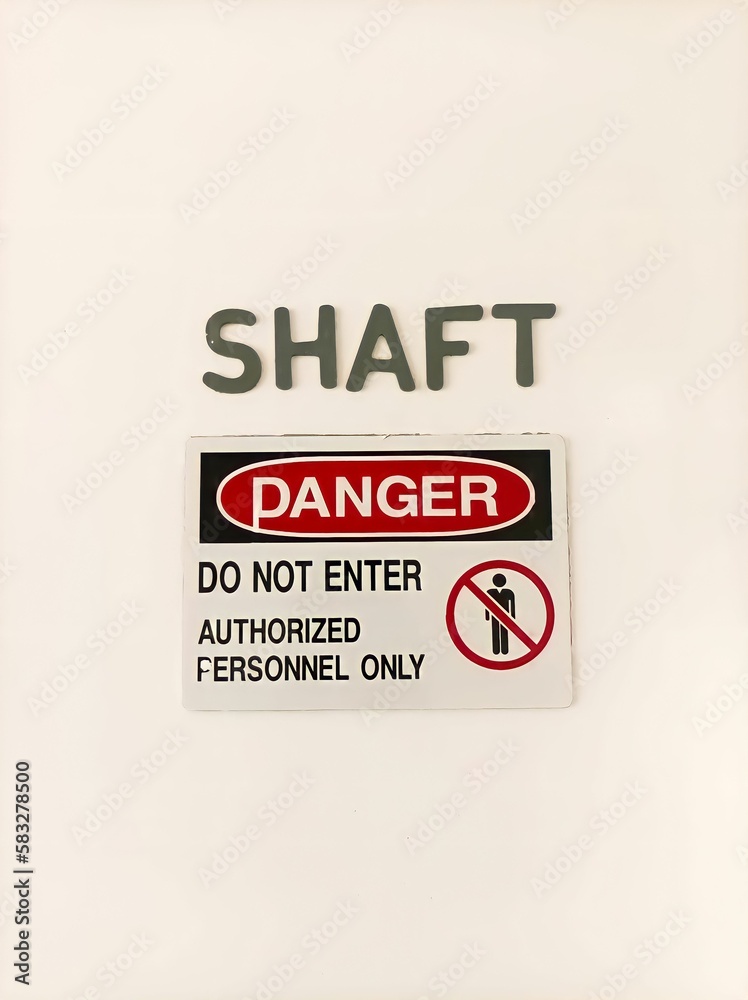 Warning sign or signboard for do not enter DANGER areas authorized for personnel only, posted on the wall of the restricted area door.. Warning sign or signboard for do not enter DANGER areas authorized for personnel only, posted on the wall of the restricted area door..