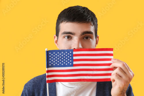 Young man with USA flag on ...